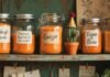 How to Build a Budget-Friendly Plant-Based Pantry? glass jars filled with red lentils labeled in messy handwritin
